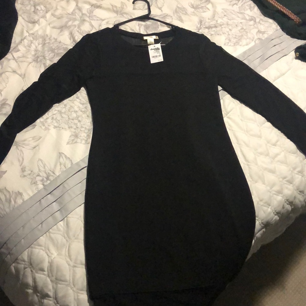 Sheer fitted little black dress